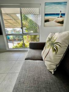 Posezení v ubytování The Palms Beach House
