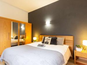 Posteľ alebo postele v izbe v ubytovaní Duplex rénové 4 pers Saint Lary Village près des Thermes et télécabine - FR-1-296-467