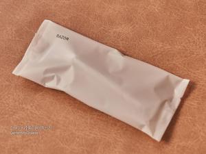 a piece of white paper sitting on top of a table at First Cabin Nishi Umeda in Osaka