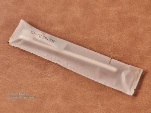a white plastic item with the words your rubbish on it at First Cabin Nishi Umeda in Osaka