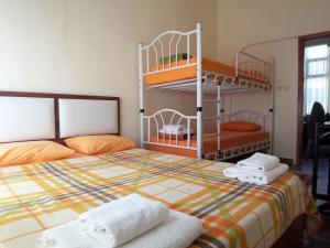 Кровать или кровати в номере izmir Tatil Evi Beach Resort Seferihisar
