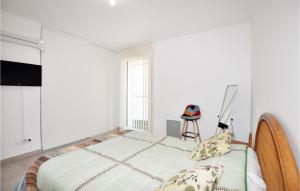 Posteľ alebo postele v izbe v ubytovaní Cozy Apartment In Canet En Roussillon