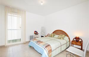 Posteľ alebo postele v izbe v ubytovaní Cozy Apartment In Canet En Roussillon + 22 fotografií