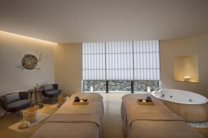 ANA InterContinental Beppu Resort & Spa by IHG客房内的一张或多张床位