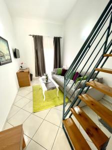Χώρος καθιστικού στο Guest House-MD