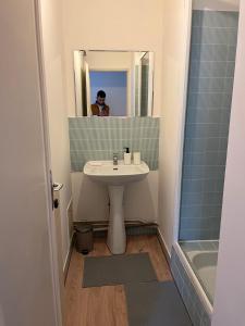 Kúpeľňa v ubytovaní Appartement T5 standing 104m2 + 2 fotografie