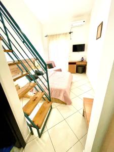 Ένα ή περισσότερα κρεβάτια σε δωμάτιο στο Guest House-MD