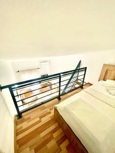Ένα ή περισσότερα κρεβάτια σε δωμάτιο στο Guest House-MD