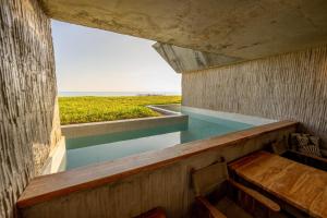 Bazén v ubytování Bamboo Zanzibar nebo v jeho okolí