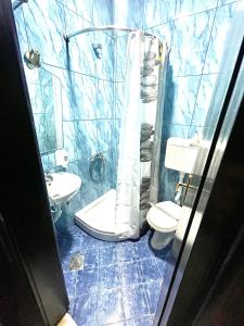 Ένα μπάνιο στο Guest House-MD