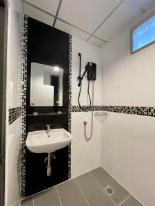 Koupelna v ubytování Klaang Muang Hotel (โรงแรมกลางเมือง)