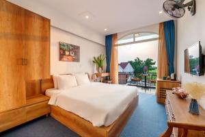 Кровать или кровати в номере Sam Retreat Hoi An Villa - Peaceful Rice-Field Retreat, 10 Minutes to Hoi An Old Town +62 фотографии