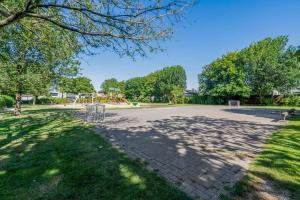 a park with a playground in the middle at Raversea op enkele minuten wandelen van de zee. in Ostend