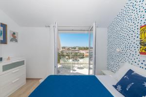 Posteľ alebo postele v izbe v ubytovaní Apartman M6