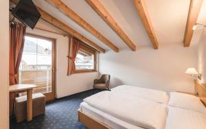 Postel nebo postele na pokoji v ubytování Hotel Schölzhorn Superior + 37 fotografií