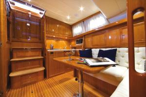 a small room with a desk in a boat at NIGHT ON BOARD in La Maddalena