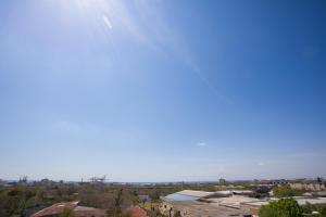 a clear blue sky over a city with houses at Marizas luxury suites #1 in Thessaloniki