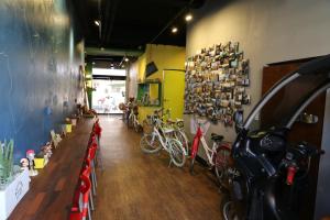 a room with a bunch of bikes on the wall at Doobaki Hostel in Gyeongju