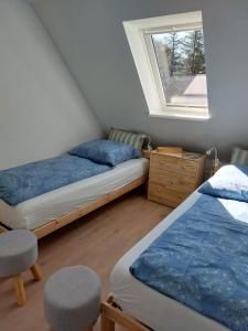 Postel nebo postele na pokoji v ubytování Klosterblick