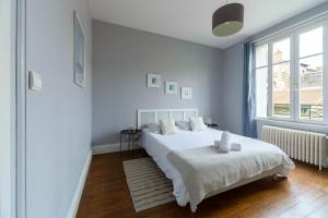Posteľ alebo postele v izbe v ubytovaní Residence Le Languedoc - Appartements design - Proche des parcs