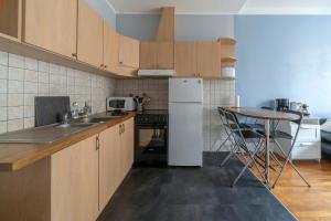 Kuchyňa alebo kuchynka v ubytovaní Residence Le Languedoc - Appartements design - Proche des parcs