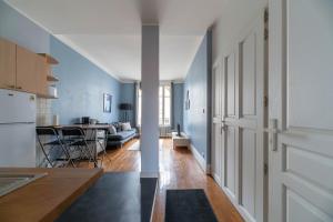 Kuchyňa alebo kuchynka v ubytovaní Residence Le Languedoc - Appartements design - Proche des parcs