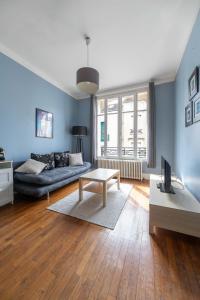 Televízia a/alebo spoločenská miestnosť v ubytovaní Residence Le Languedoc - Appartements design - Proche des parcs
