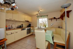 Køkken eller tekøkken på Ferienhaus Hinter-Bollhagen