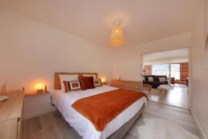 Postel nebo postele na pokoji v ubytování Le Panoramic - Vue exceptionnelle