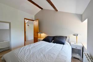 Łóżko lub łóżka w pokoju w obiekcie Maison Chandolas - Charmante maison pour 10 voyageurs