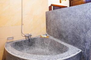 Koupelna v ubytování Taman Ayu Legian Hotel