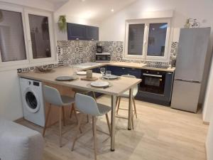 Kuchyňa alebo kuchynka v ubytovaní Cottage neuf - Forêt de Tronçais