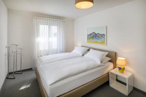 Postel nebo postele na pokoji v ubytování Aparthotel Familie Hugenschmidt