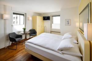 Postel nebo postele na pokoji v ubytování Aparthotel Familie Hugenschmidt