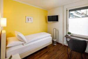 TV a/nebo společenská místnost v ubytování Aparthotel Familie Hugenschmidt