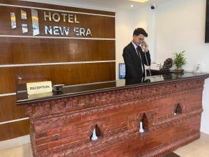 Členové personálu v ubytování Hotel New Era
