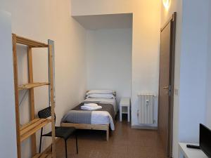 Postel nebo postele na pokoji v ubytování Como City Life