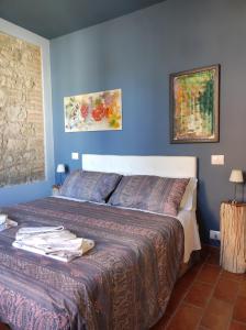 Posteľ alebo postele v izbe v ubytovaní B & B Casolara
