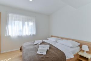 Postel nebo postele na pokoji v ubytování Resort Mirakul