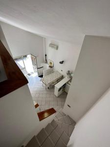 a view of a living room with a couch at Le vasche - by the sea - nice apartment in Cavo