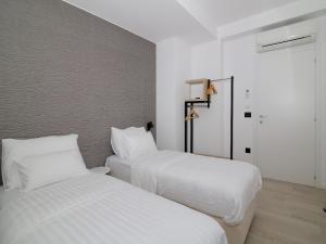 Postel nebo postele na pokoji v ubytování Luxury Amarin Apartment