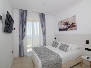 Postel nebo postele na pokoji v ubytování Luxury Amarin Apartment