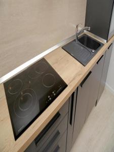 Kuchyň nebo kuchyňský kout v ubytování Luxury Amarin Apartment