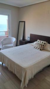 Postel nebo postele na pokoji v ubytování Vista Fraile- Atico en la Costa Cálida