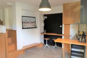 Η κουζίνα ή μικρή κουζίνα στο Tiny Apartment