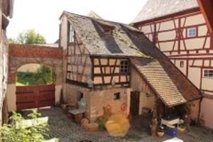a model of a house with a barn at Schloßschänke Eysölden in Thalmässing