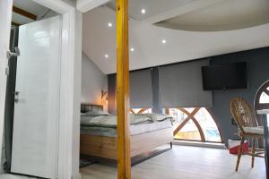 Letto o letti in una camera di Apartman Time out 2