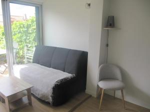 Ruang duduk di STUDIO BANDOL 2 Etoiles Climatisé