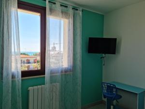 A television and/or entertainment centre at CASA FLAN