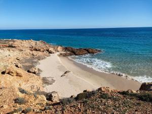 Gallery image of Roro's house- Villa with terrace 100m from the beach - Pinus Village in Fort Village +20 photos